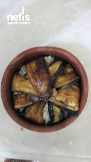 Güveçte Patlıcanlı Pilav Kapama